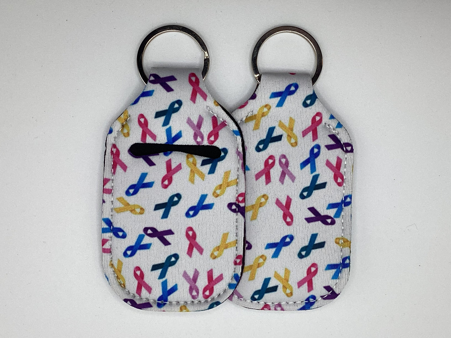 Multi Cancer Ribbon, White Background Neoprene Hand Sanitizer Holder