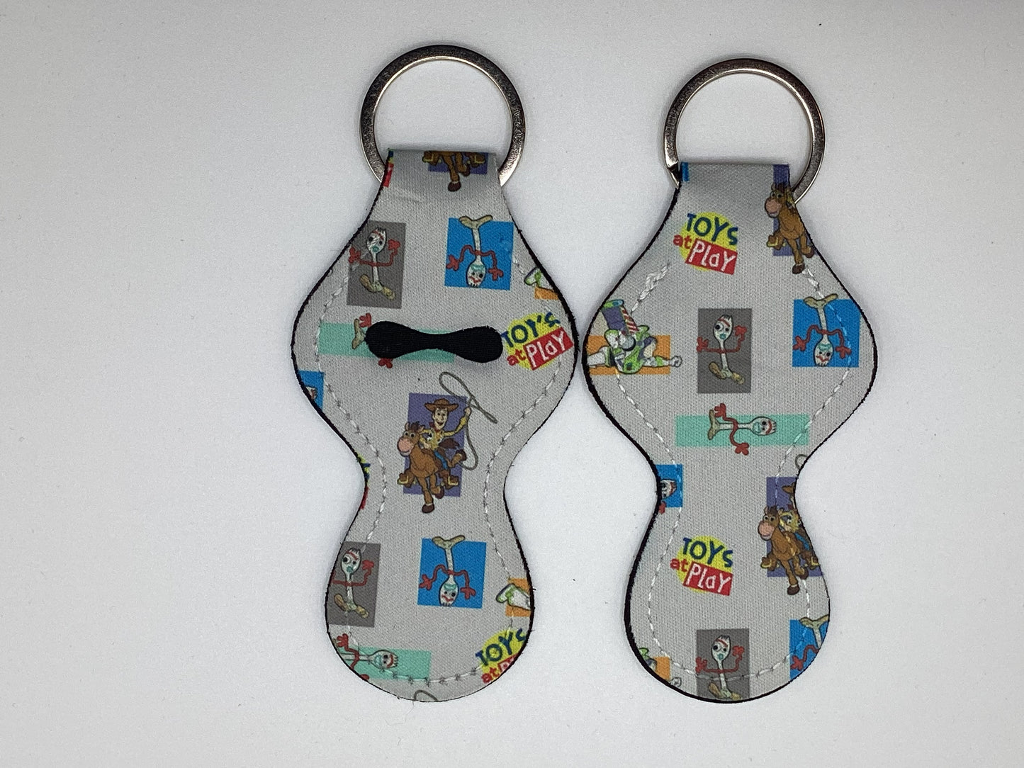 Toys at Play, Story, Neoprene Chapstick Holder Keychain
