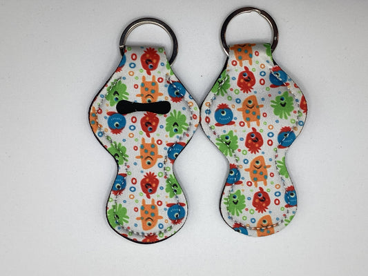 White Monsters Neoprene Chapstick Holder Keychain